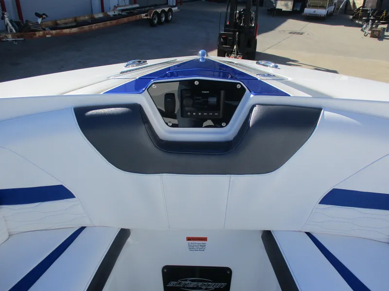 Slide: The Image of 2021 Sunsation 40CCX boat interior with blue and white seating. - 36