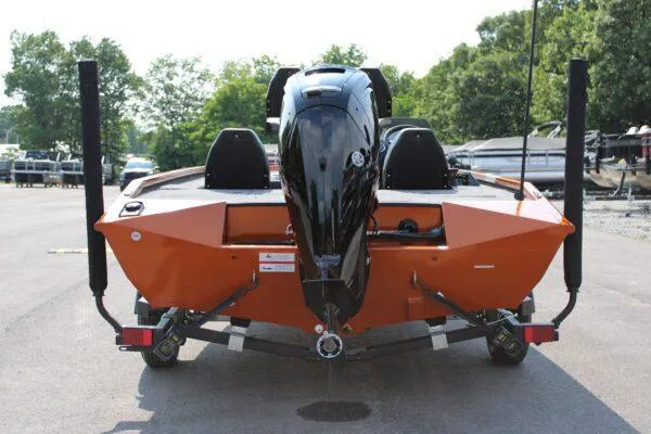Slide: The Image of 2023 Lowe Stinger 178 boat rear view with outboard motor. - 3