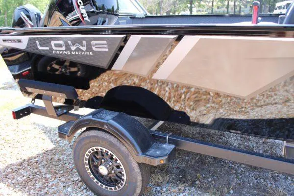 Slide: The Image of 2023 Lowe FM1675 Fishing Machine boat on a trailer. - 4