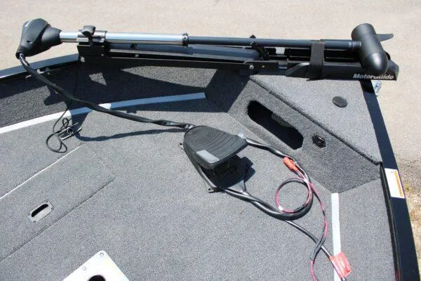 Slide: The Image of 2023 Lowe FM1675 boat with trolling motor and foot pedal on deck. - 7