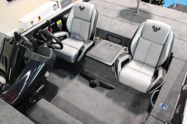 Slide: The Image of 2023 Phoenix 921 ELITE boat interior with dual seats and steering console. - 9