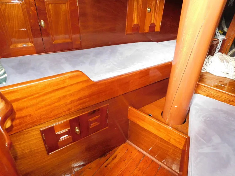 Slide: The Image of Interior of 1983 Custom Murray Peterson Coaster III with polished wood and cushioned seating. - 6