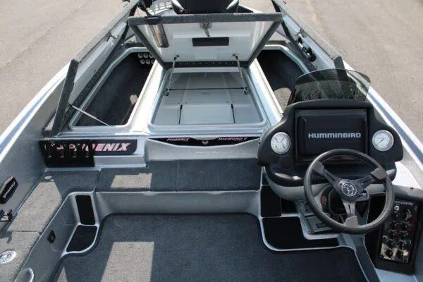 Slide: The Image of 2024 Phoenix 818 boat interior with Humminbird electronics and spacious storage compartments. - 5