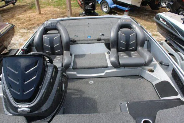 Slide: The Image of 2017 Nitro Z20 boat interior with dual seats and motor. - 6