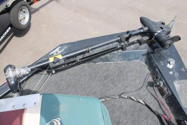 Slide: The Image of 1997 Xpress H56 boat with trolling motor on deck. - 3