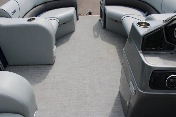 Slide: The Image of 2019 Lowe SS210 Super Sport boat interior with gray seating and console. - 5
