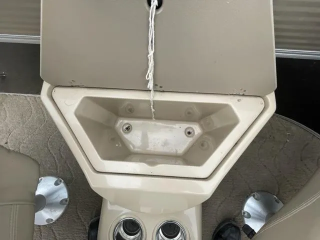 Slide: The Image of 2014 Starcraft Limited 236 boat interior storage compartment. - 7