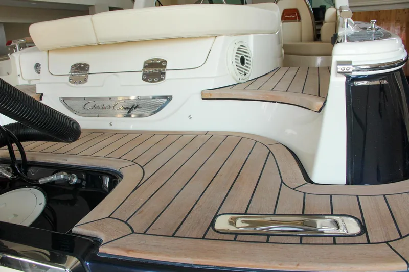 Slide: The Image of 2022 Chris-Craft Launch 25 GT boat with elegant teak decking and luxurious seating. - 34