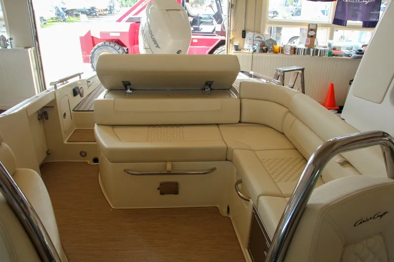 Slide: The Image of 2022 Chris-Craft Launch 25 GT interior with beige leather seating and elegant design. - 47