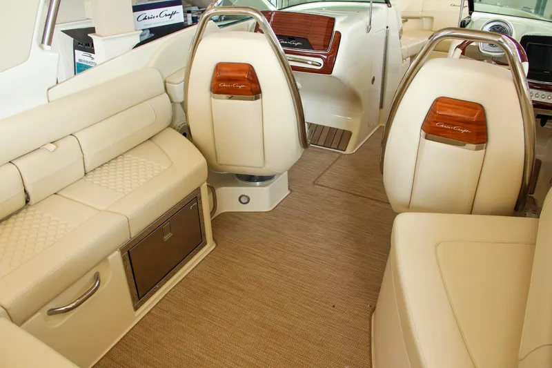 Slide: The Image of 2022 Chris-Craft Launch 25 GT interior with luxurious beige seating and elegant wood accents. - 48