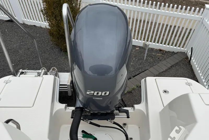 Slide: The Image of 2024 Sailfish 226 boat with Yamaha 200 outboard motor, rear view. - 14
