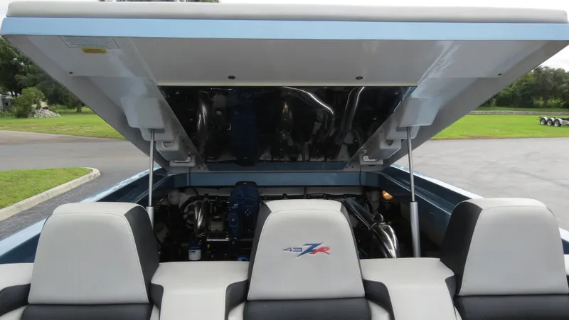 Slide: The Image of 2006 Donzi 43 ZR boat engine compartment with open hatch. - 36