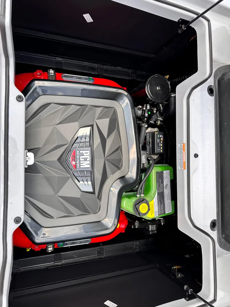 Slide: The Image of 2023 Nautique G23 engine compartment with PCM engine. - 29