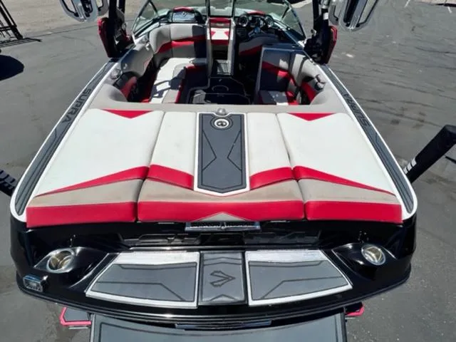 Slide: The Image of 2014 Supra SC350-550 boat interior with red and white seating. - 10