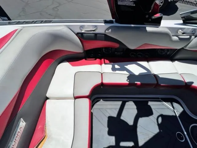 Slide: The Image of 2014 Supra SC350-550 boat interior with red and white seating. - 14