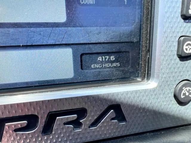 Slide: The Image of Close-up of 2014 Supra SC350-550 engine hours display showing 417.6 hours. - 19