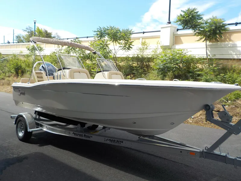 Slide: The Image of 2024 Scout 195 Sport Dorado boat on trailer, side view. - 3