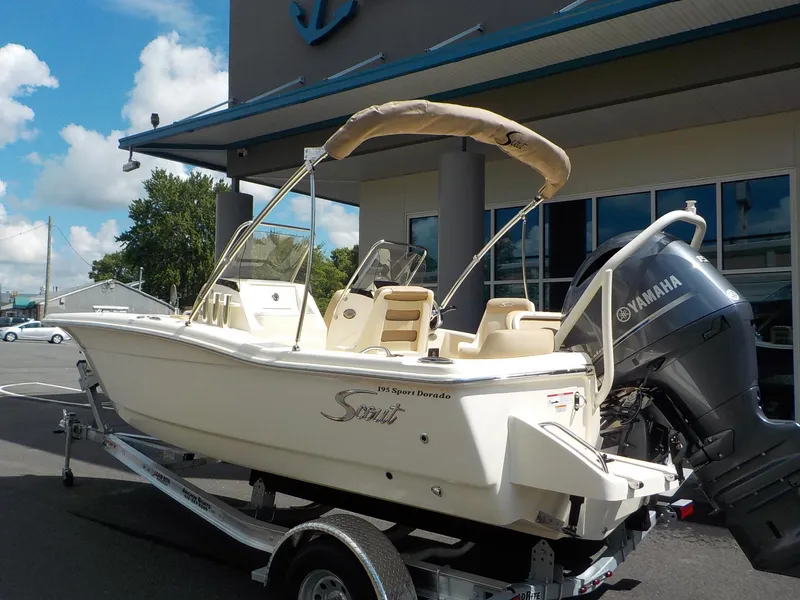 Slide: The Image of 2024 Scout 195 Sport Dorado boat with Yamaha engine on trailer. - 8