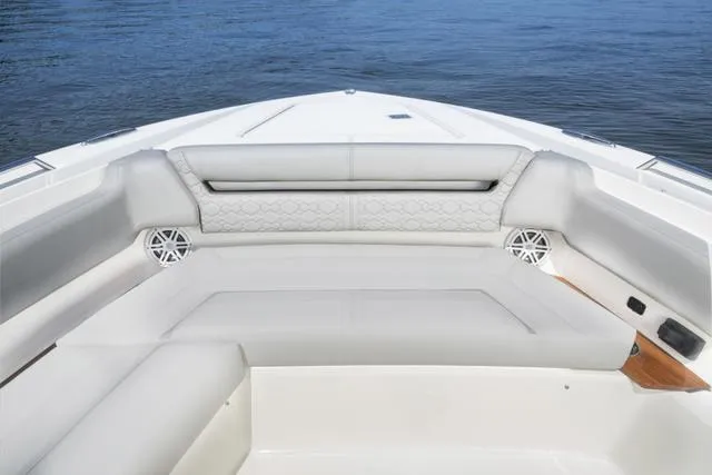 Slide: The Image of 2024 Tiara Yachts 38LS boat with luxurious seating and ocean view. - 18