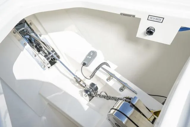 Slide: The Image of Anchor compartment of 2024 Tiara Yachts 38LS with fresh water access. - 21