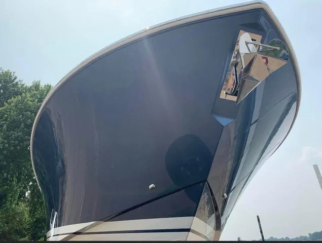 Slide: The Image of 2024 Tiara Yachts 38LS bow view with sleek design. - 3