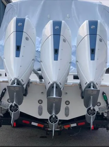 Slide: The Image of Triple outboard engines on a 2024 Tiara Yachts 38LS. - 6