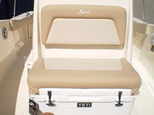 Slide: The Image of 2023 Scout 195 Sportfish boat seat with Yeti cooler integration. - 6