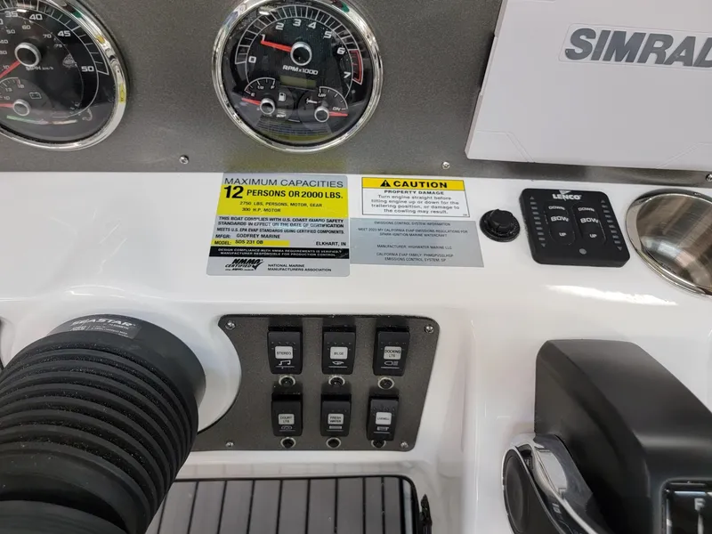 Slide: The Image of Steering wheel and dashboard of 2024 Hurricane SunDeck Sport CC 231 OB boat. - 17