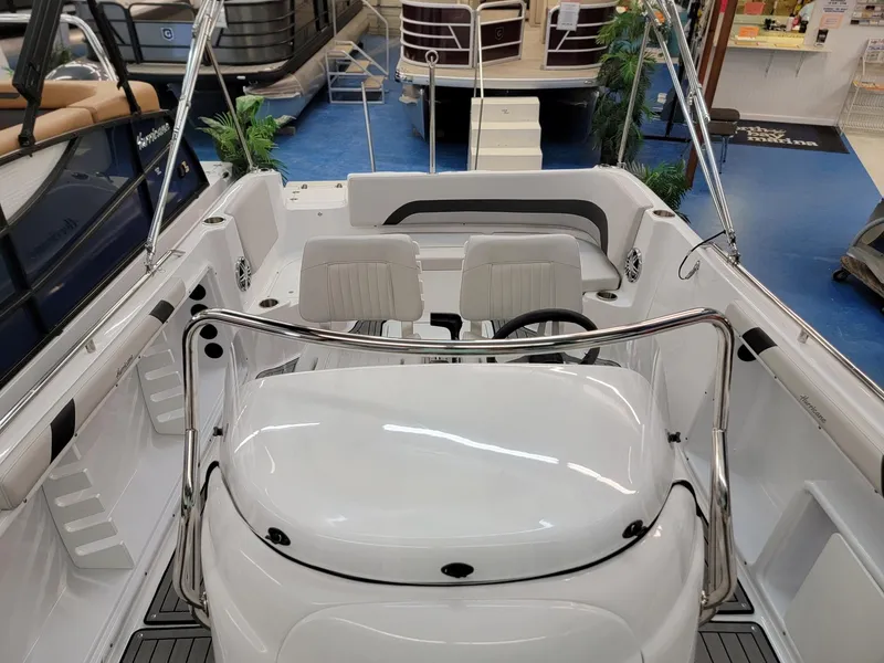 Slide: The Image of 2024 Hurricane SunDeck Sport CC 231 OB boat interior, bow seating area with cup holders. - 7