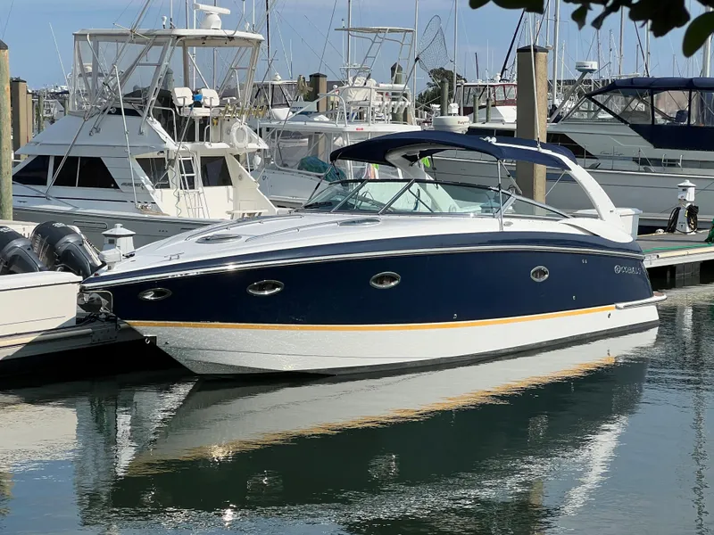 The Image of 2004 Cobalt 360 boat docked at a marina. - 0