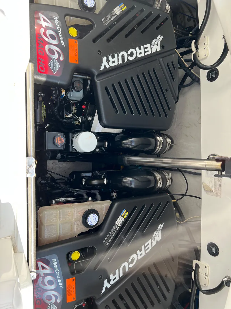 Slide: The Image of 2004 Cobalt 360 boat engine compartment with twin MerCruiser 496 engines. - 36