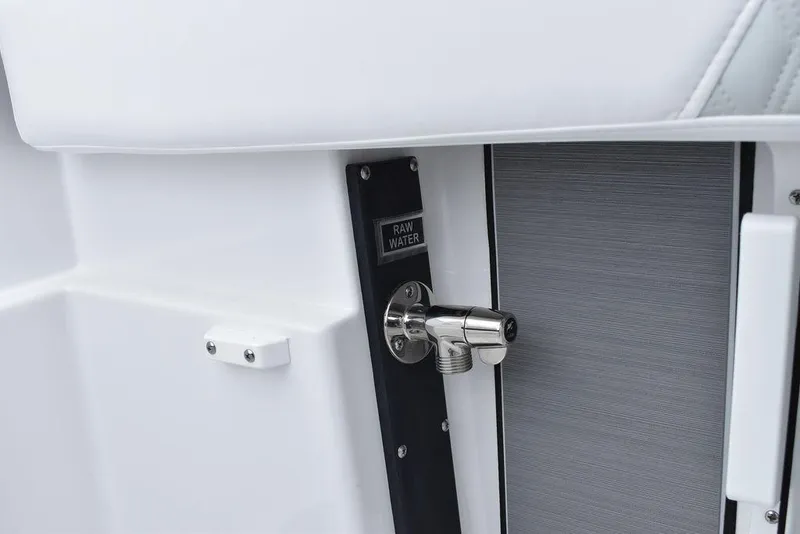 Slide: The Image of 2024 Blackfin 222CC boat raw water outlet detail. - 26