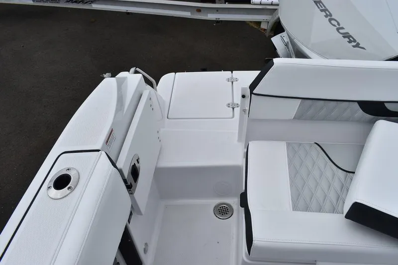 Slide: The Image of 2024 Blackfin 222CC boat interior with white seating and deck details. - 28