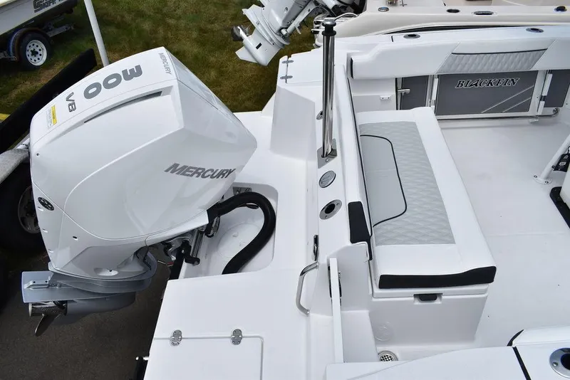 Slide: The Image of 2024 Blackfin 222CC boat with Mercury 400 engine, featuring sleek seating and modern design. - 8