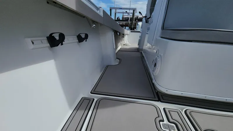 Slide: The Image of 2005 Yellowfin 31 boat deck with sleek design and modern fittings. - 20
