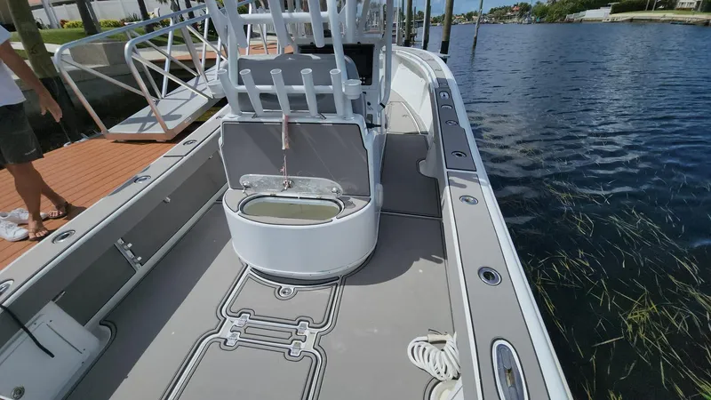 Slide: The Image of 2005 Yellowfin 31 boat interior, docked by calm waters. - 43