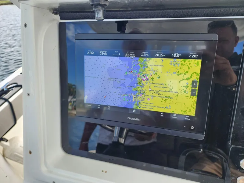 Slide: The Image of Garmin navigation display on 2005 Yellowfin 31 boat, showing detailed marine map. - 49