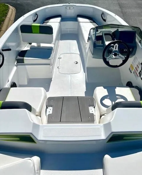 Slide: The Image of 2023 Tahoe T16 boat interior with seating and steering wheel. - 3