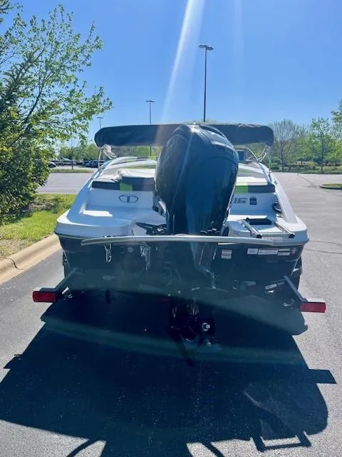 Slide: The Image of 2023 Tahoe T16 boat with outboard motor in parking lot. - 5