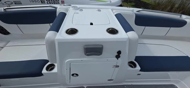 Slide: The Image of 2024 Tahoe 2150 boat interior with seating and storage compartments. - 15