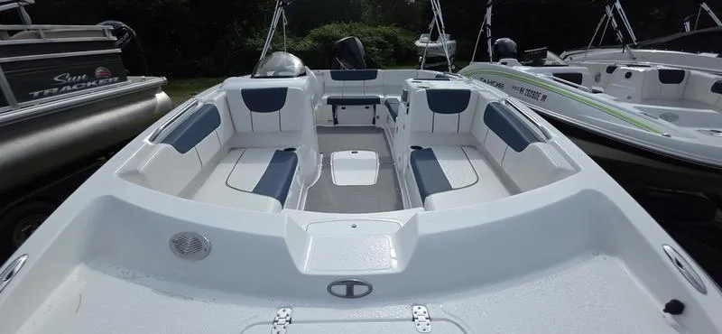 Slide: The Image of 2024 Tahoe 2150 boat interior with spacious seating and modern design. - 6