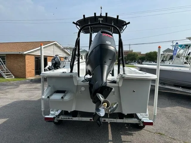 Slide: The Image of 2024 Savannah SS21 boat with outboard motor on trailer, rear view. - 10