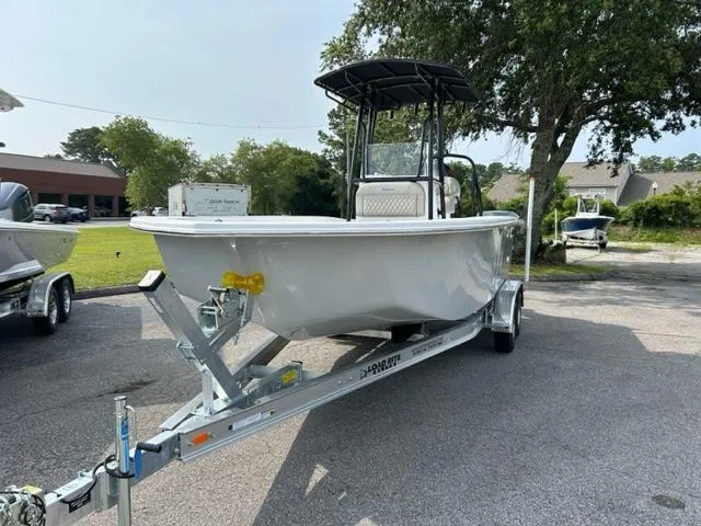 Slide: The Image of 2024 Savannah SS21 boat on trailer in outdoor setting. - 4