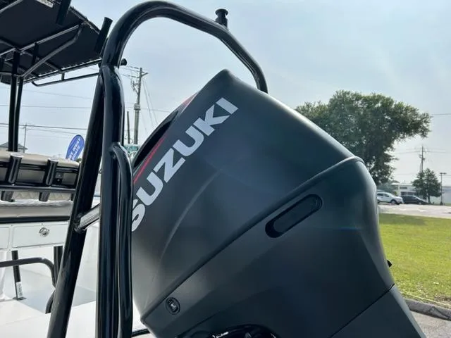 Slide: The Image of Close-up of Suzuki outboard motor on 2024 Savannah SS21 boat. - 8