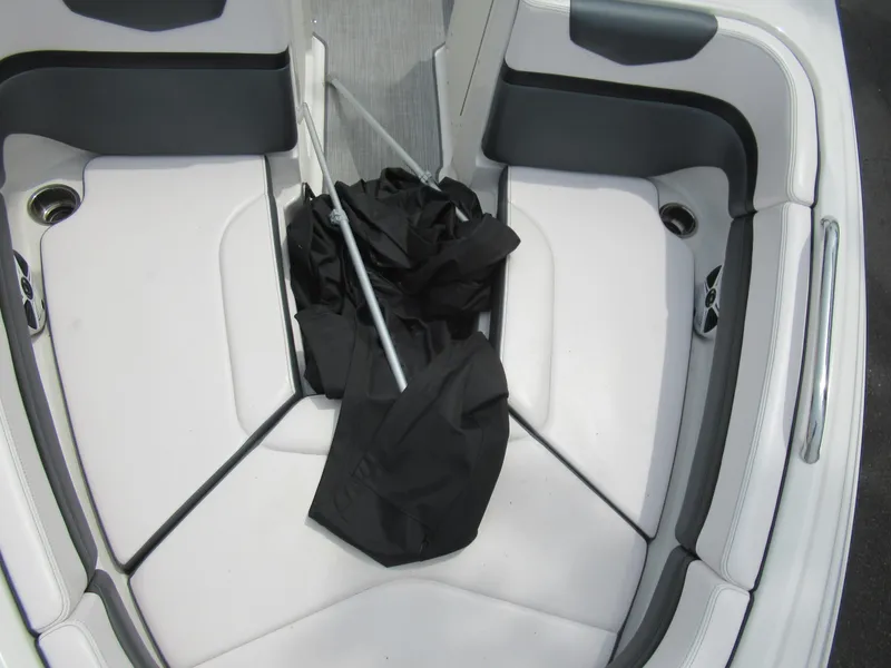 Slide: The Image of Interior seating of 2020 Vortex 203 VR boat with black cover and pole. - 19