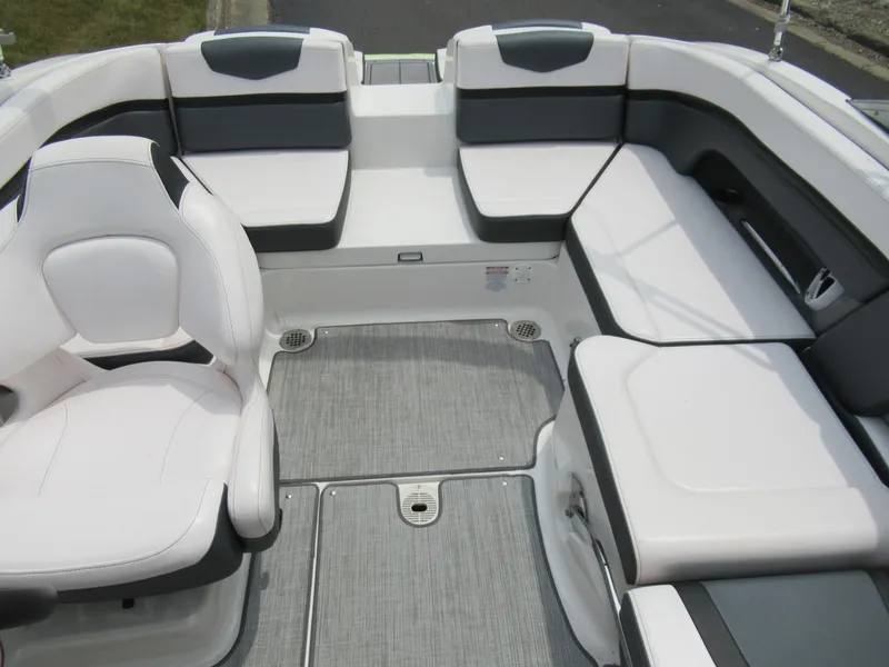 Slide: The Image of 2020 Vortex 203 VR boat interior with white and gray seating. - 22