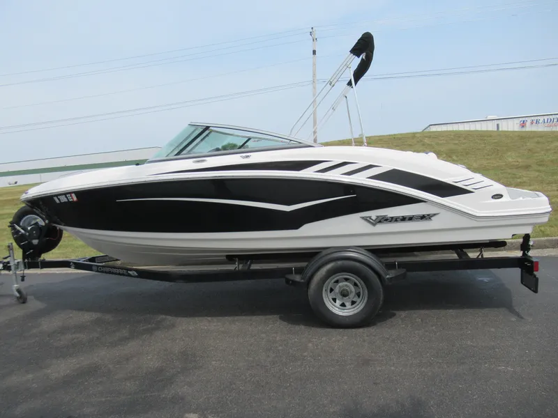 Slide: The Image of 2020 Vortex 203 VR boat on trailer, black and white design. - 4