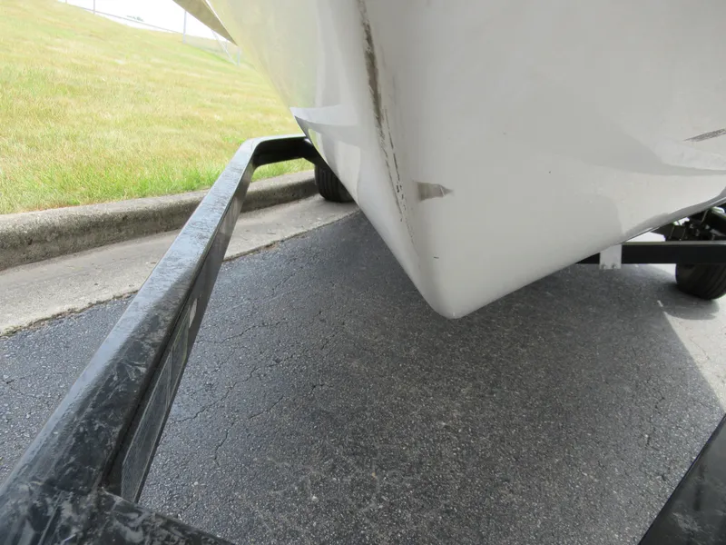 Slide: The Image of 2020 Vortex 203 VR boat hull on trailer, showing minor damage. - 7