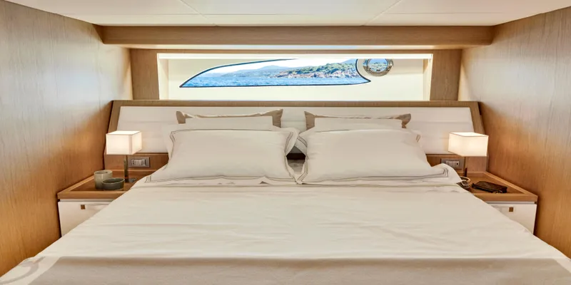 Slide: The Image of Luxurious bedroom interior of 2024 Solaris 57 Lobster yacht with elegant bedding and ambient lighting. - 11