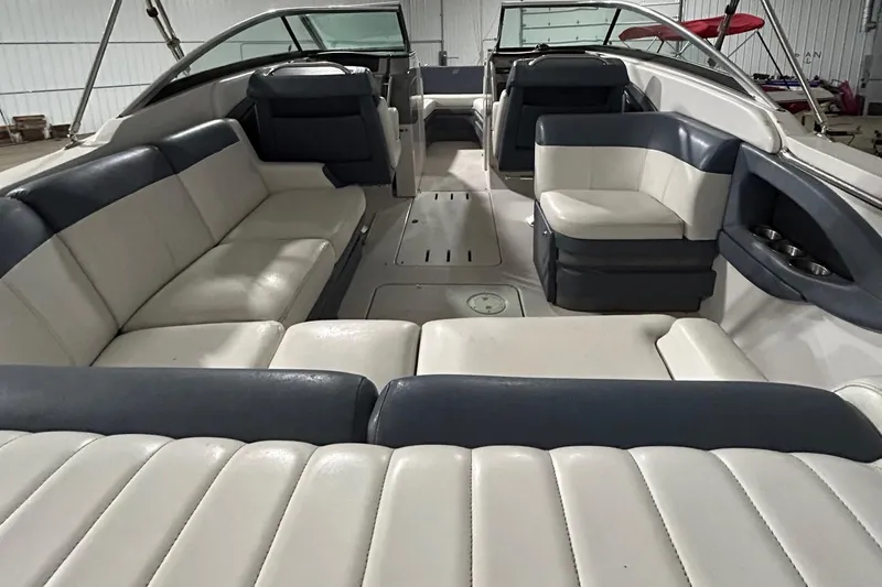 Slide: The Image of 2008 Four Winns 262 boat interior with spacious seating and modern design. - 17